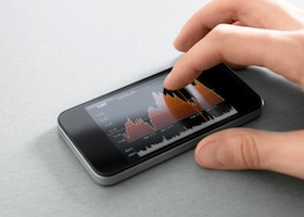 Hand touching stock market chart on mobile smart phone.